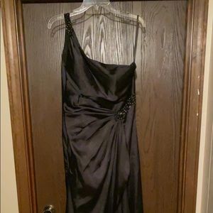 Black floor length formal gown with bead detail